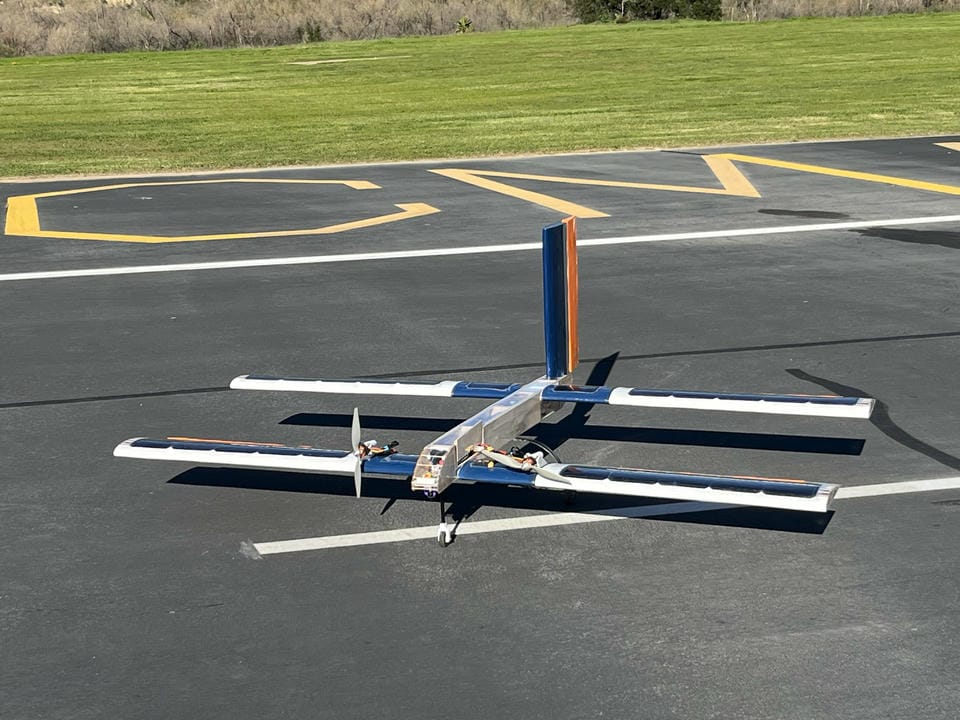 The front of the solar airplane, sitting on the runway